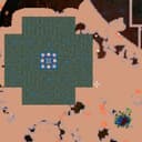 8-bit 도트 그래픽으로 된, 사막의 상공을 찍은 지도 스크린샷. 남색의 거대한 미로 단면이 보인다.